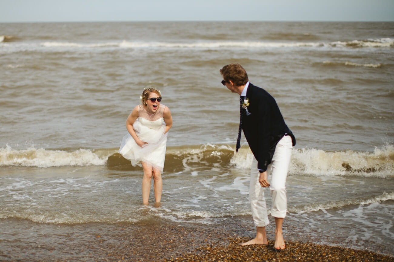 bride and groom beach portraits at southwold wedding