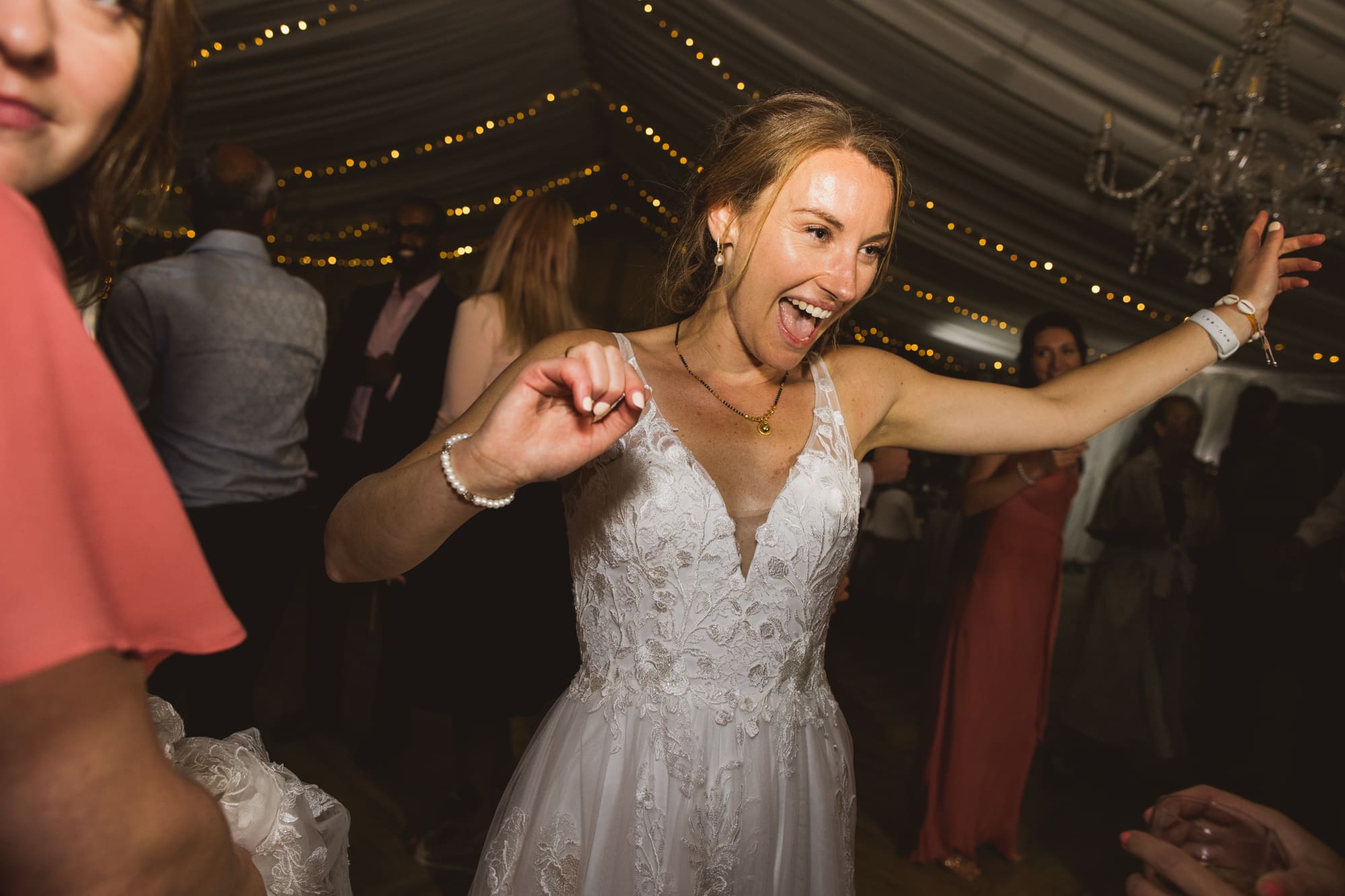 bride dancing at glemham hall wedding reception