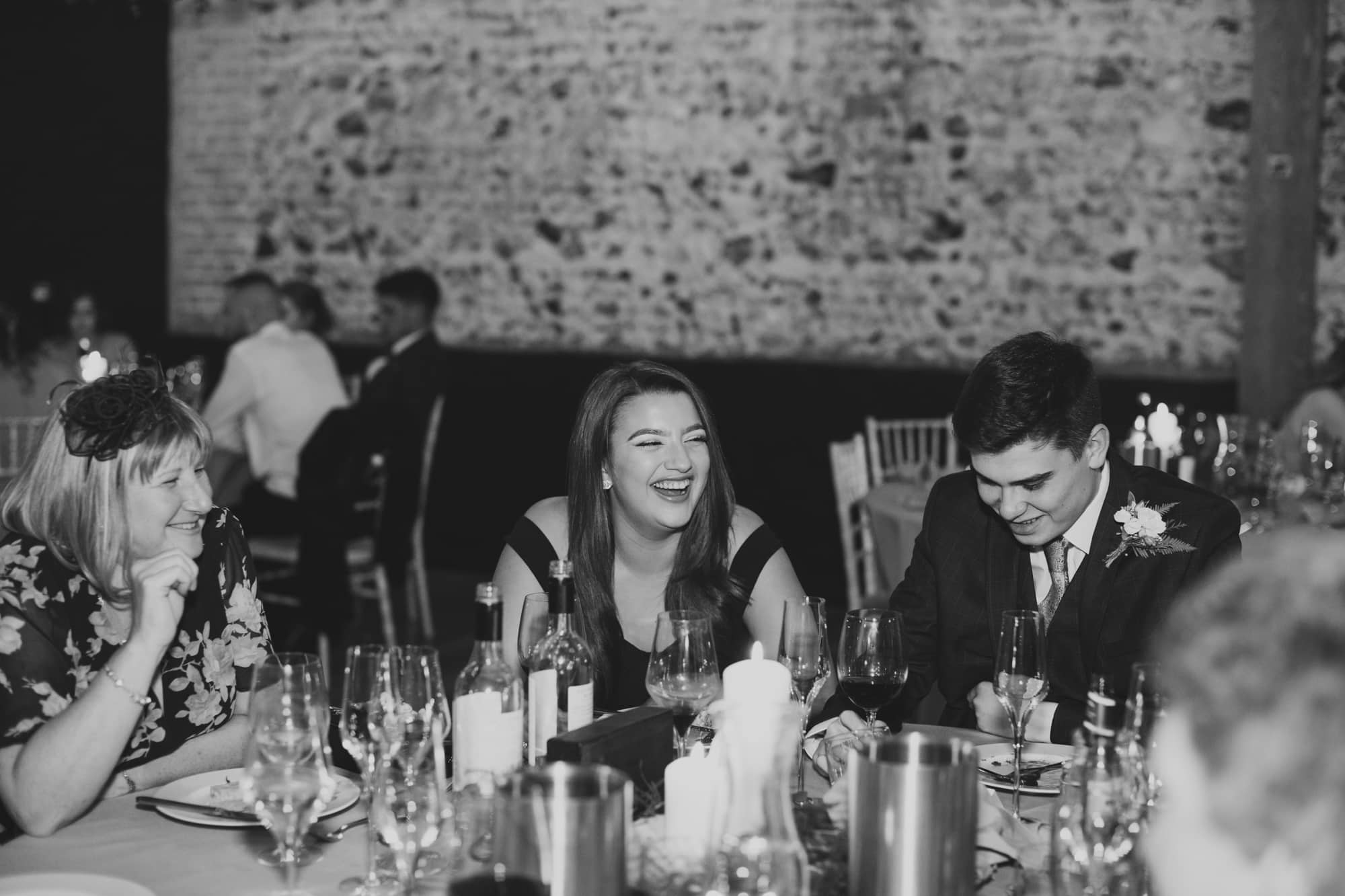 guests laughing at wedding breakfast