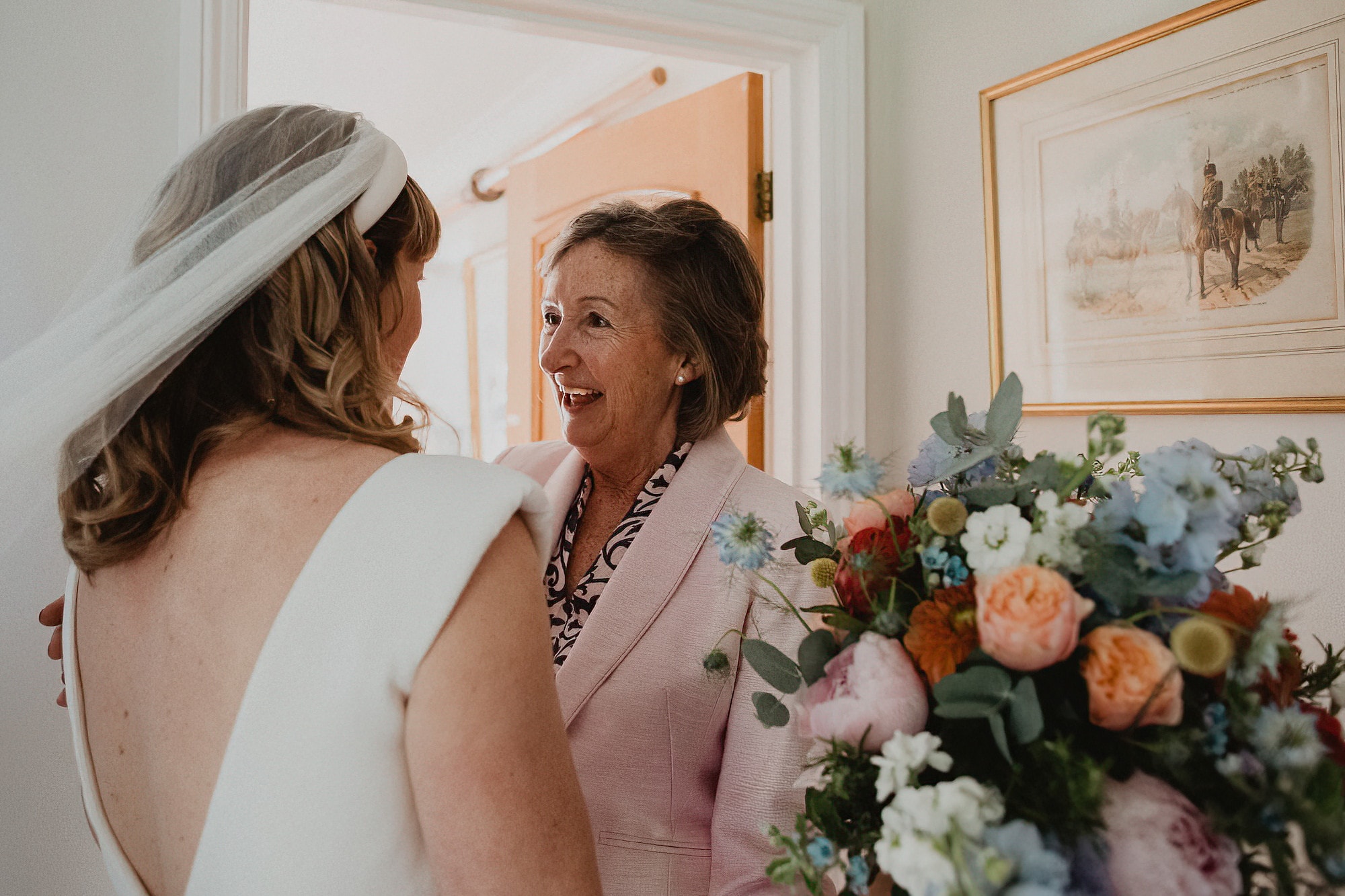 brides mum feeling emotional at seeing her daughter in wedding dress