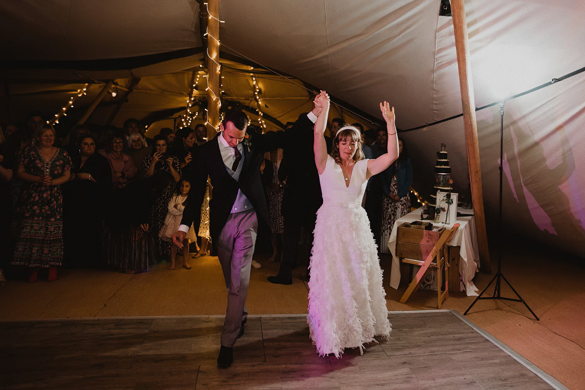 bride and groom first dance at tipi wedding