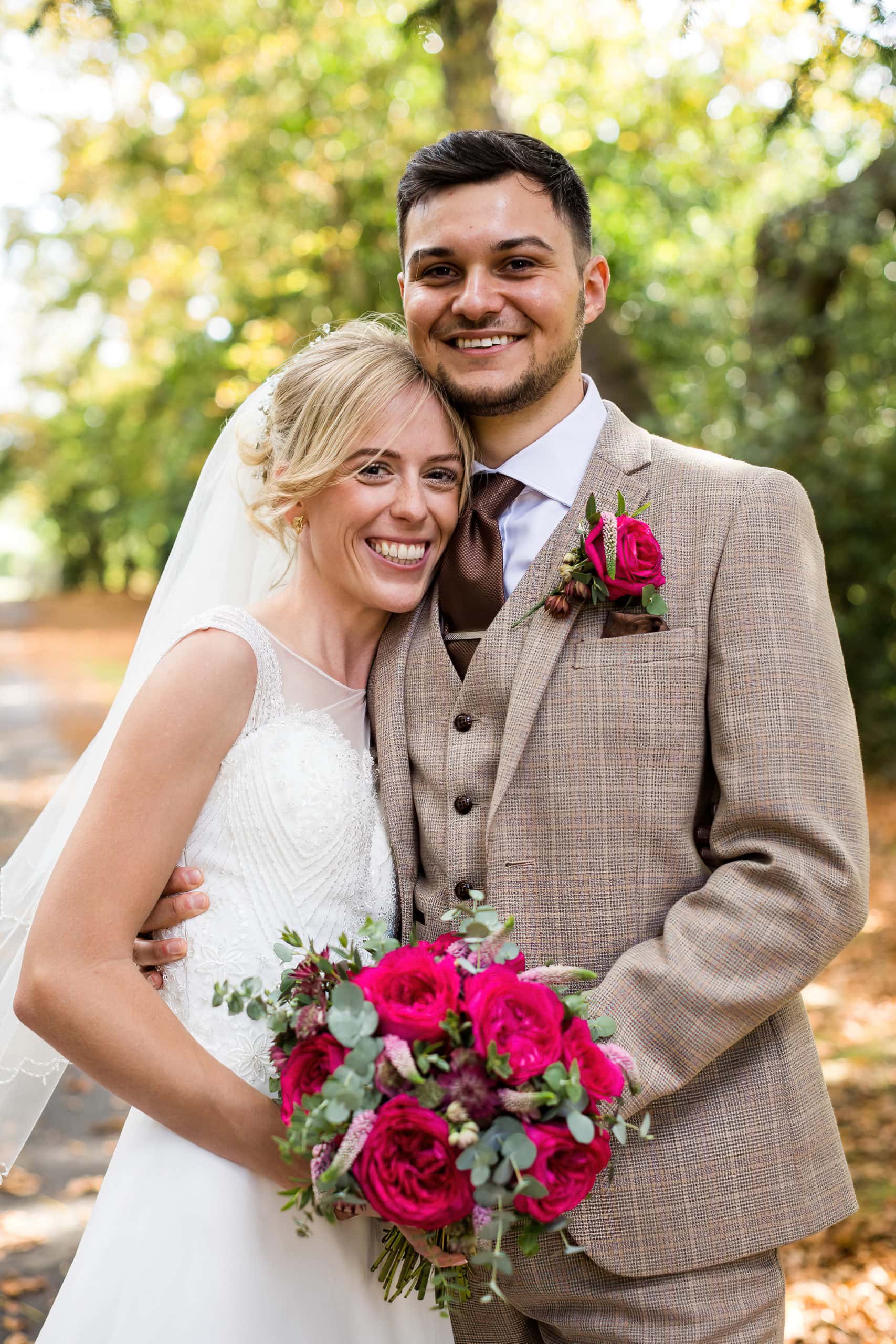 bride and groom portrait with trees
