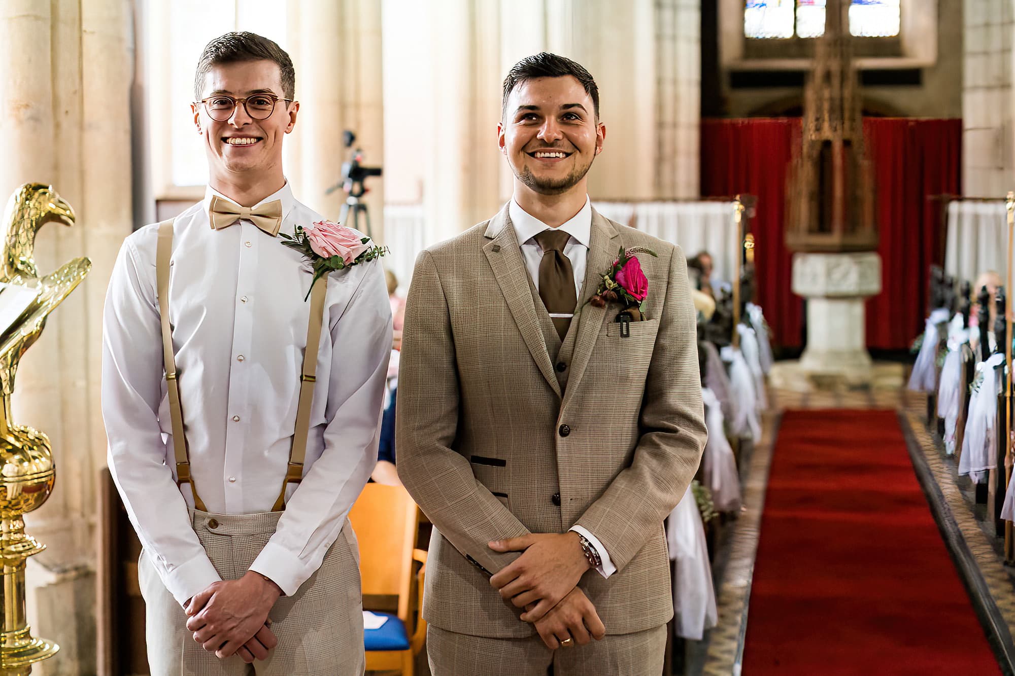 groom and best man waiting in church for bride to arrive