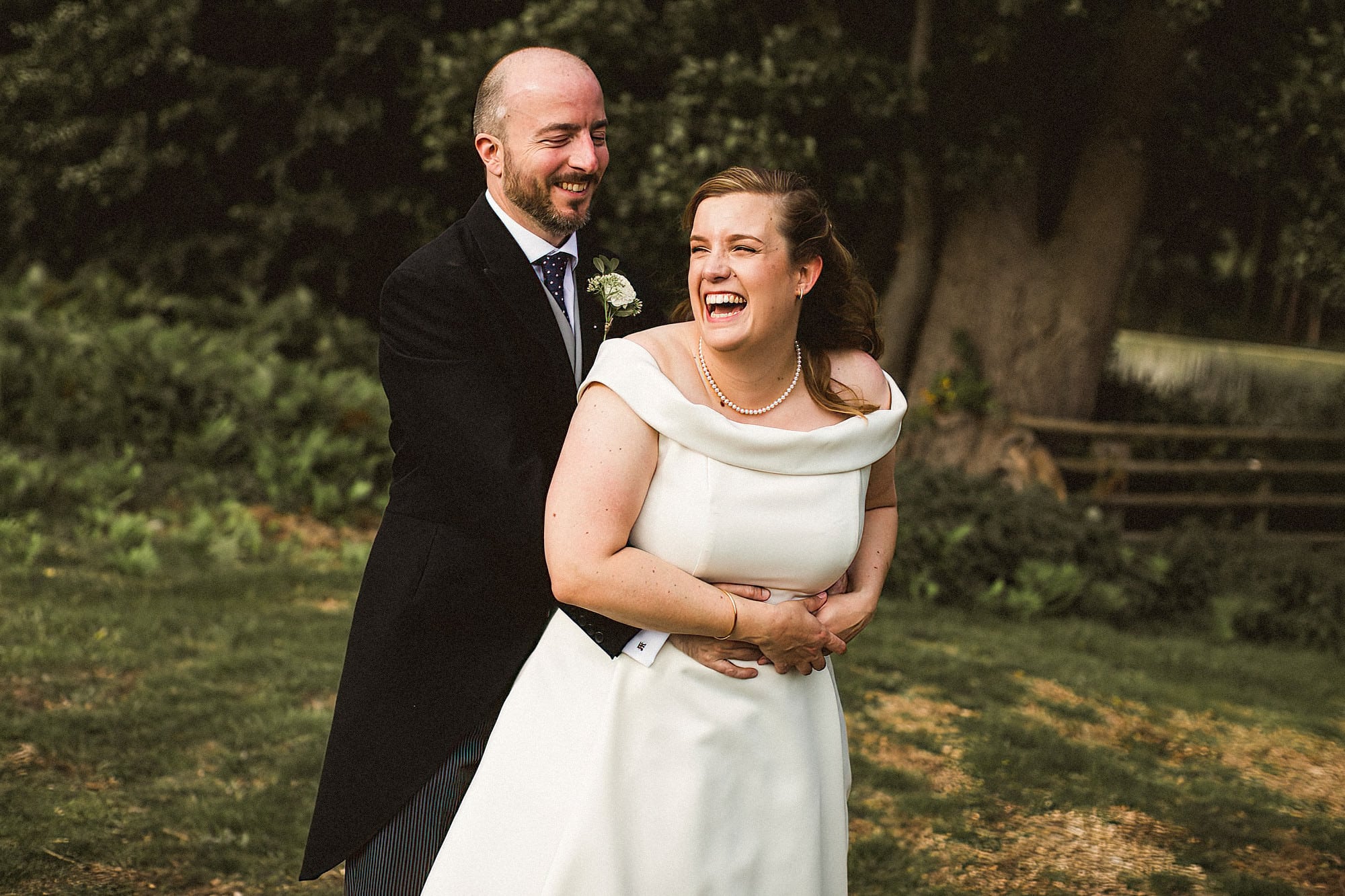 bride and groom in parkland at henham park