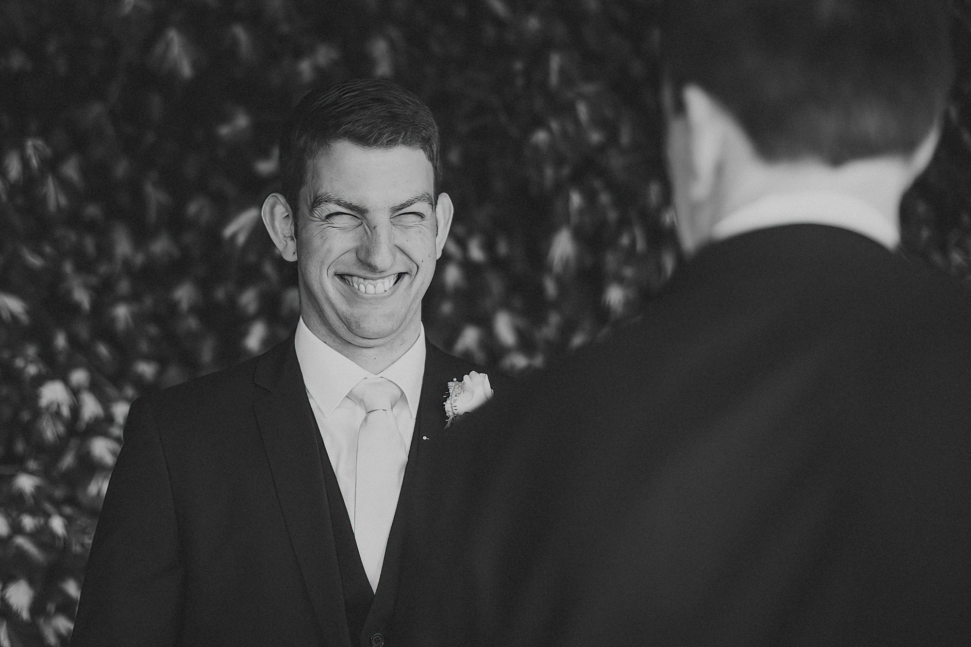 wedding guest laughing